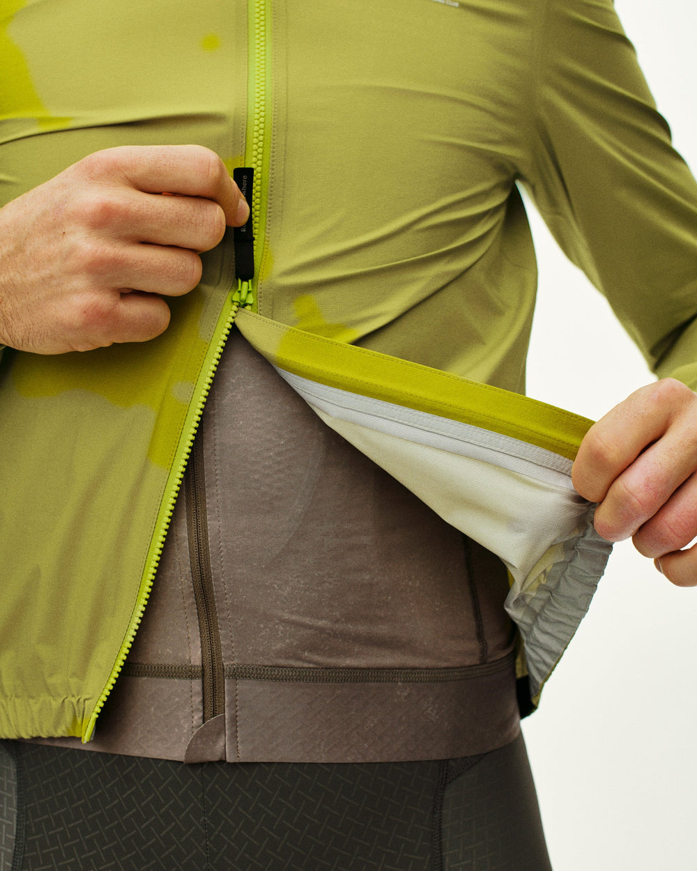 Mechanism Rain Jacket